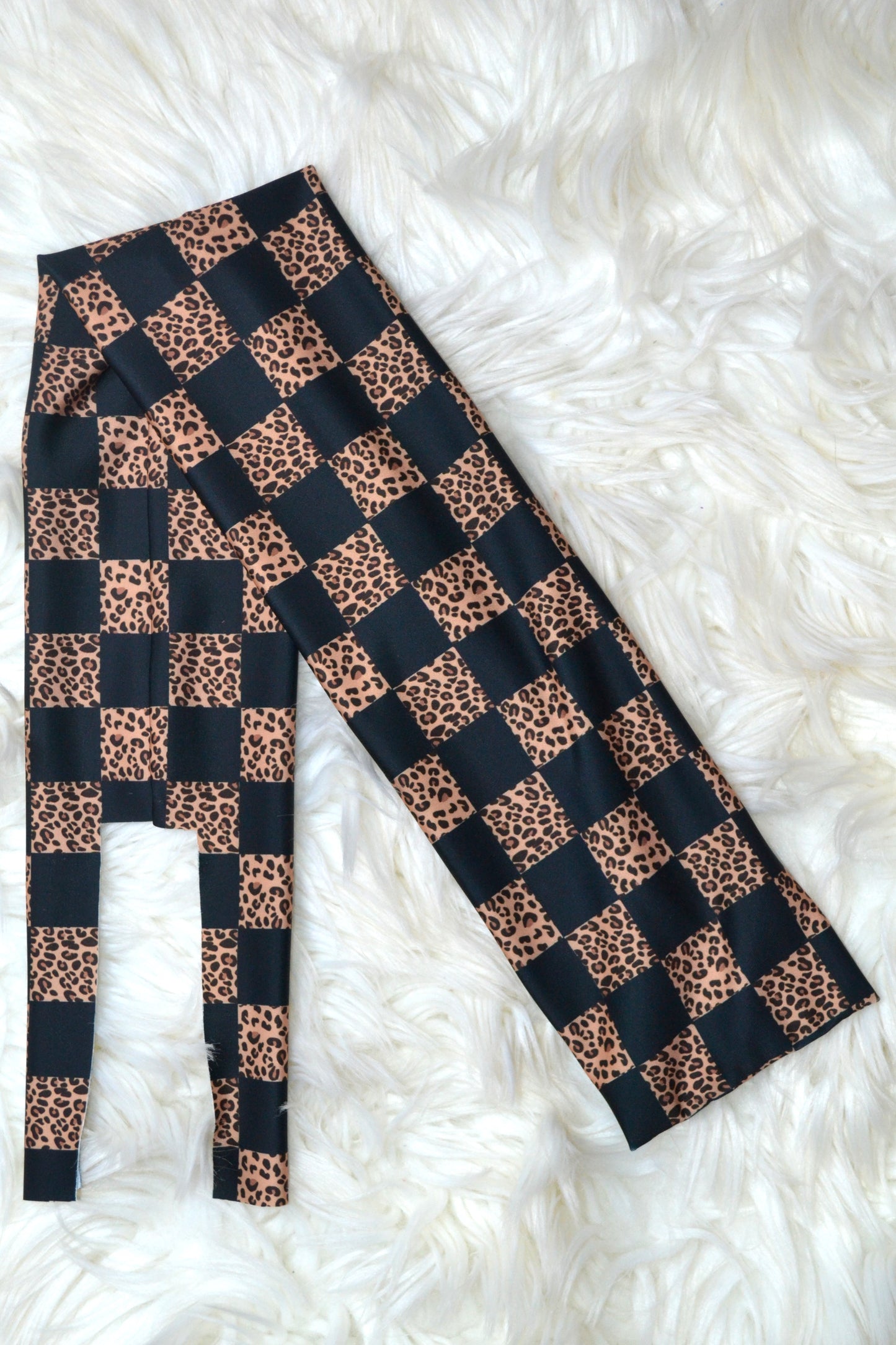 Cheetah Checker Tail Bag