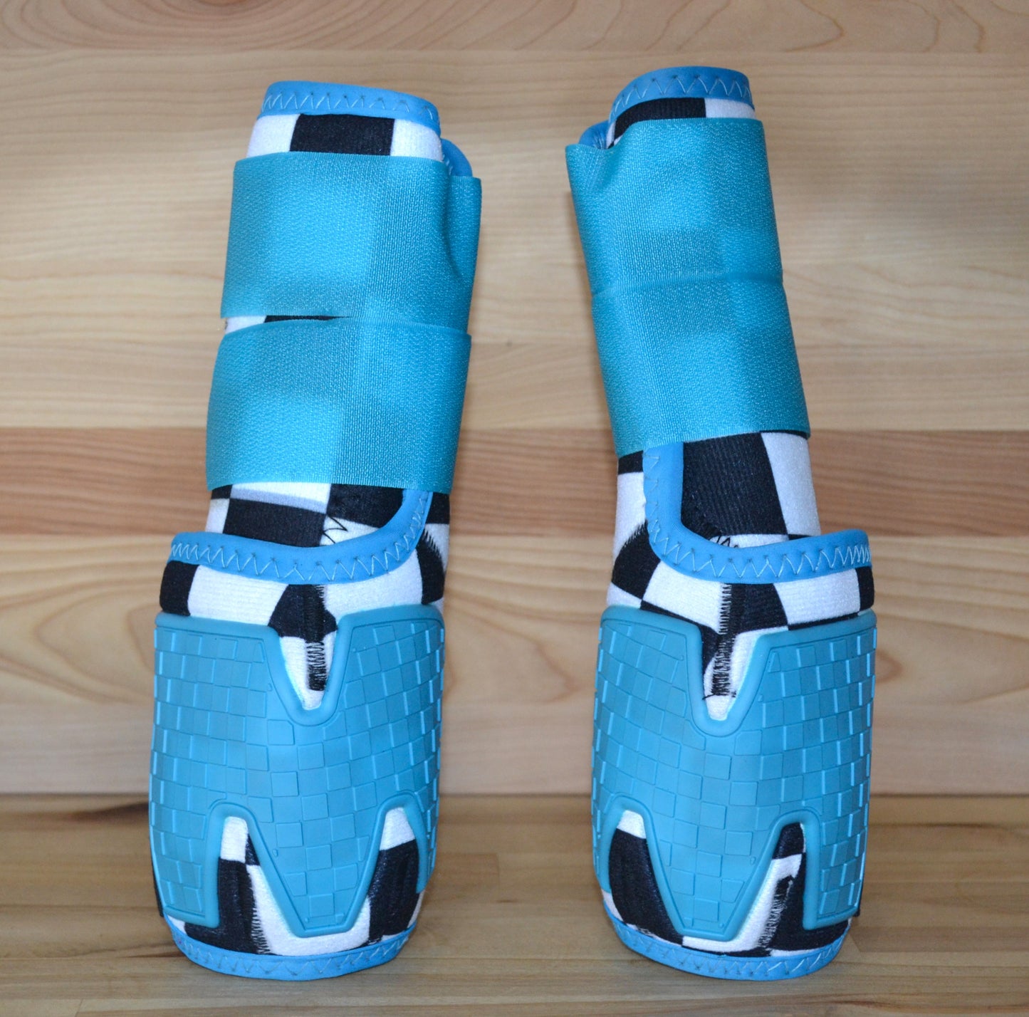 Checker with Teal Splint Boots