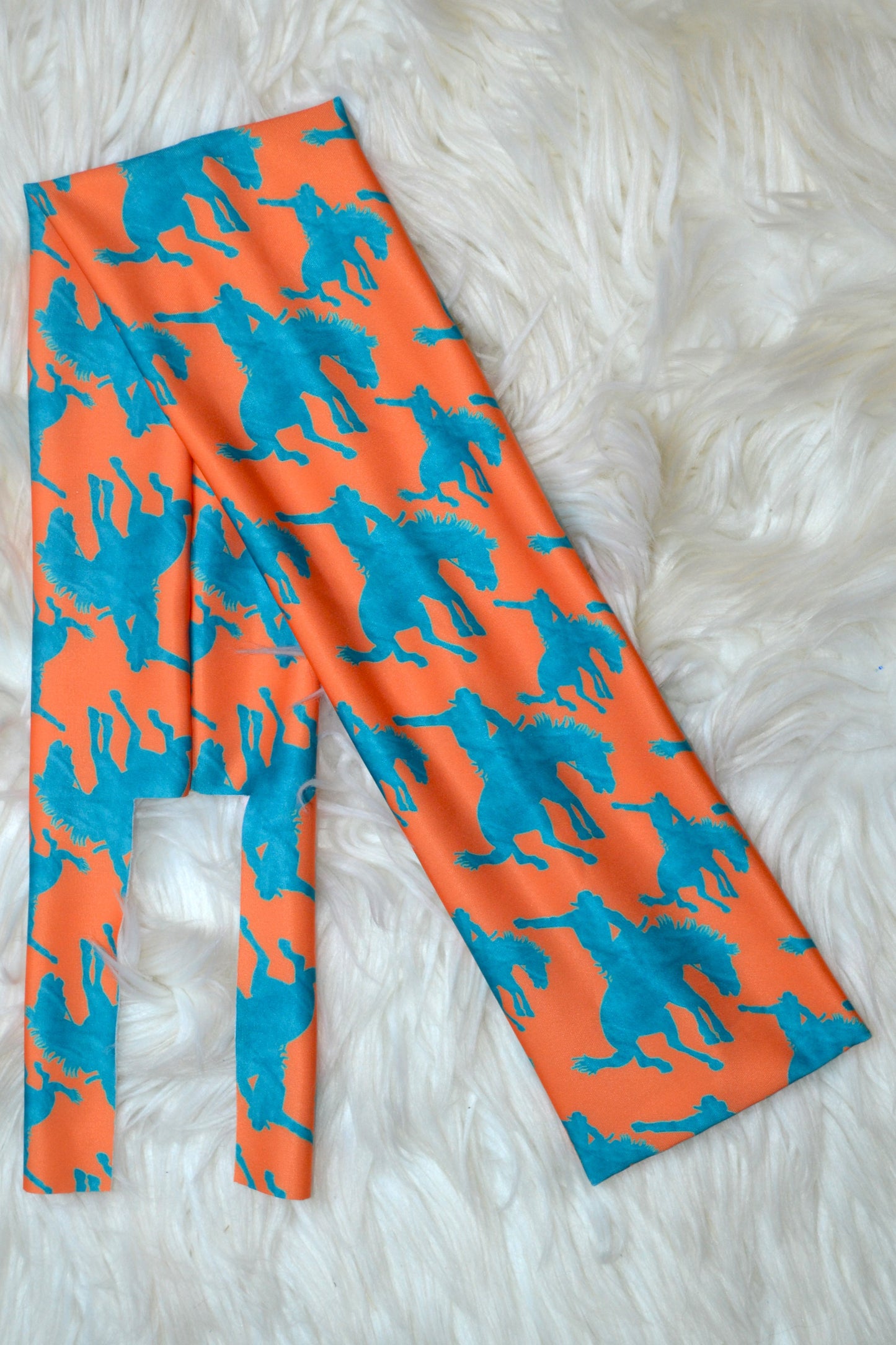 Orange Teal Bronc Tail Bag