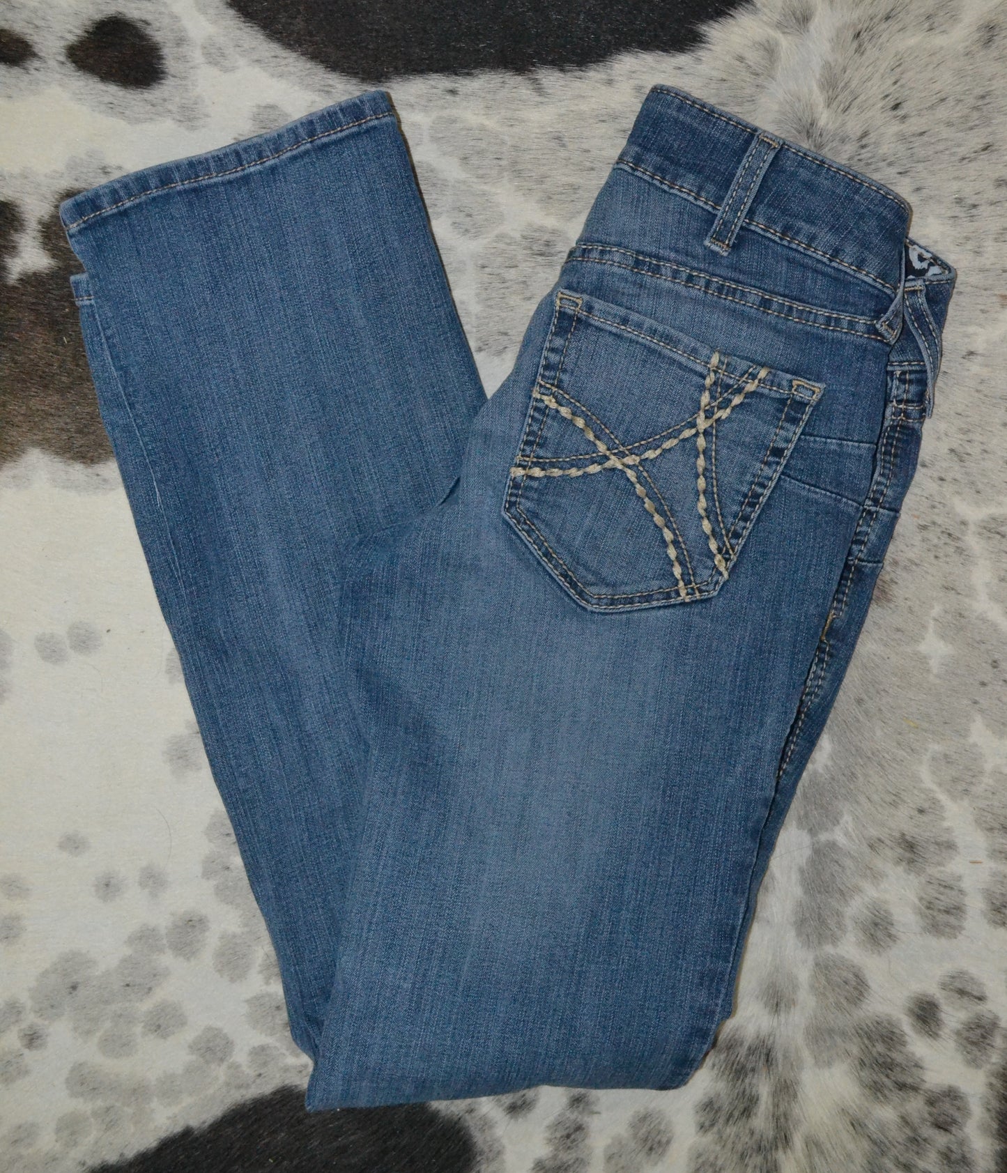 Ariat Size 28R with a 32 Inseam